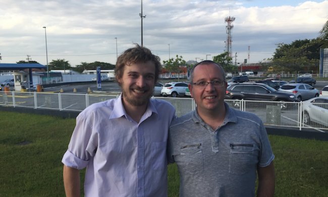 Leandro Zandona and Gadi Kovarski in front of parking lot