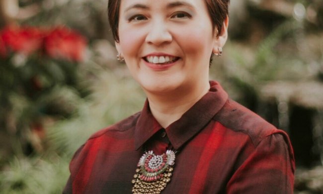 Luc Miranda folding her arms 