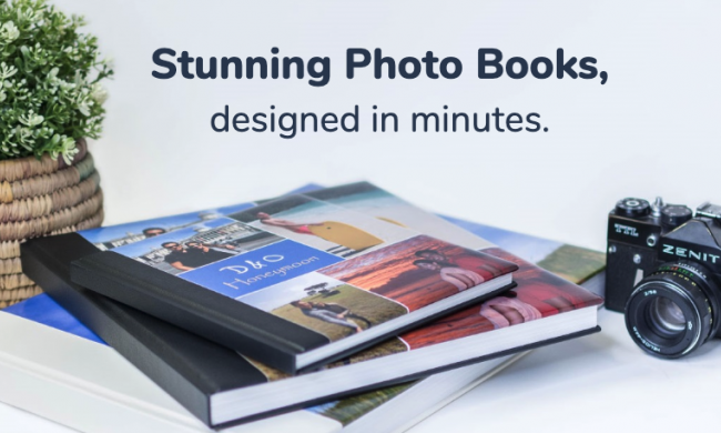 Photobooks & camera on desk