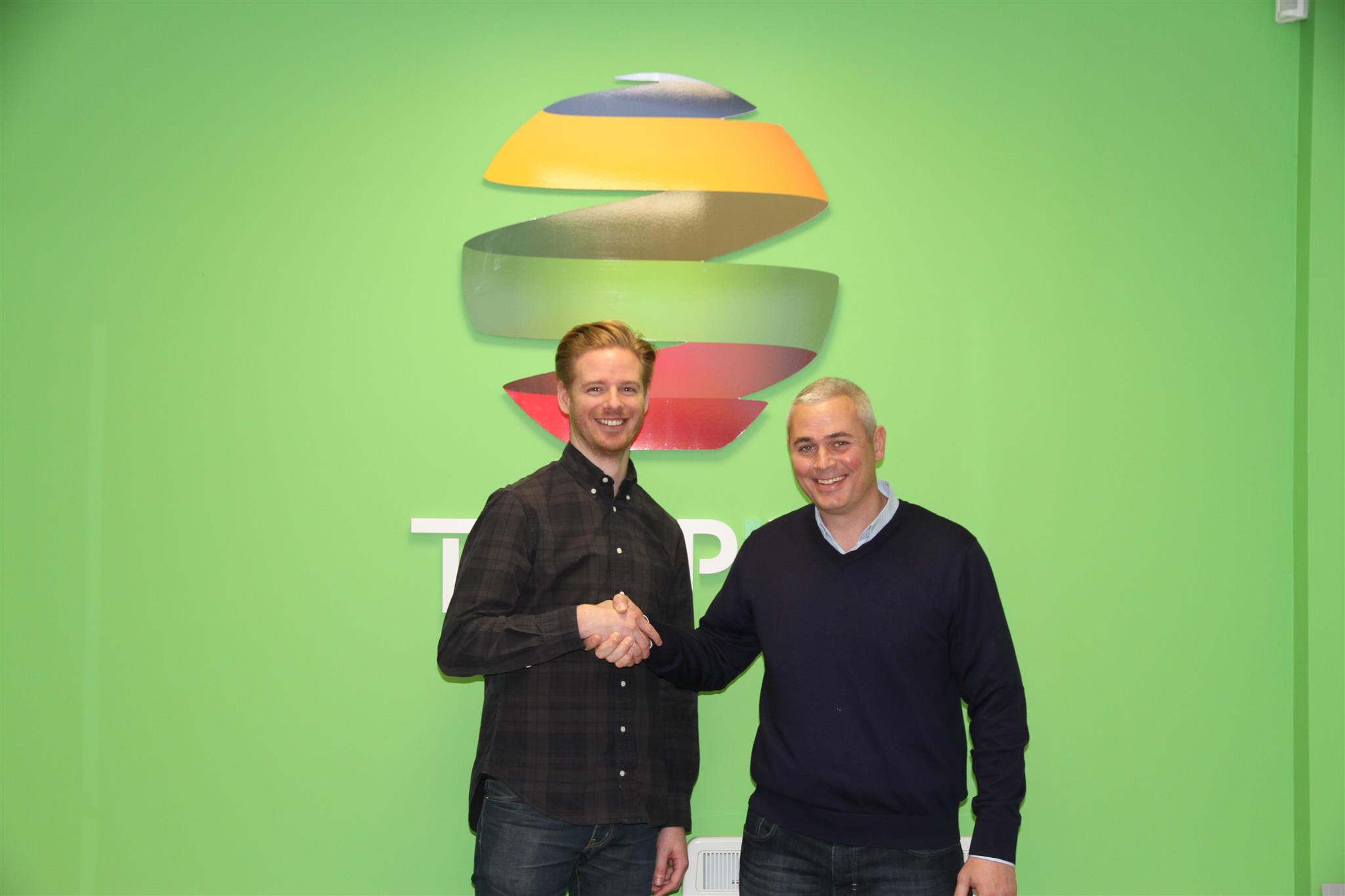 Michael Carey and Karim Sam shaking hands