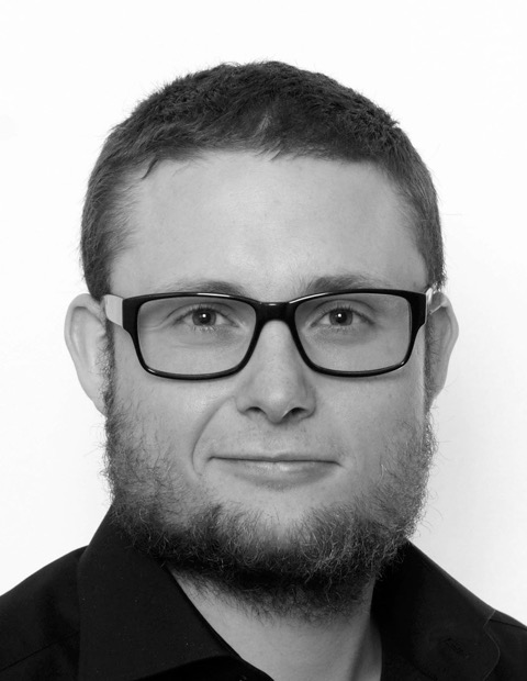 bearded man with glasses